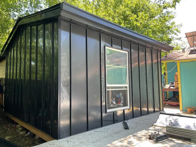 Black standing seam metal wall panels for Roof Inspection in Alice